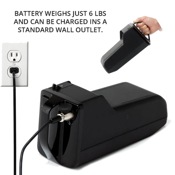 A black battery is being charged in the wall outlet.