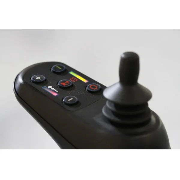 A remote control is shown with buttons on it.