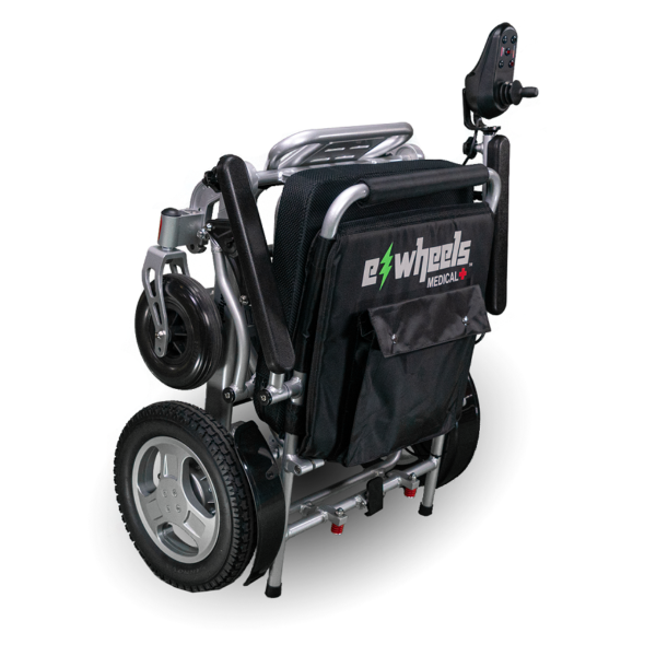 A black and silver wheelchair with wheels attached.