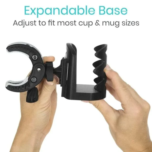 A person holding up a cup holder with the words expandable base.