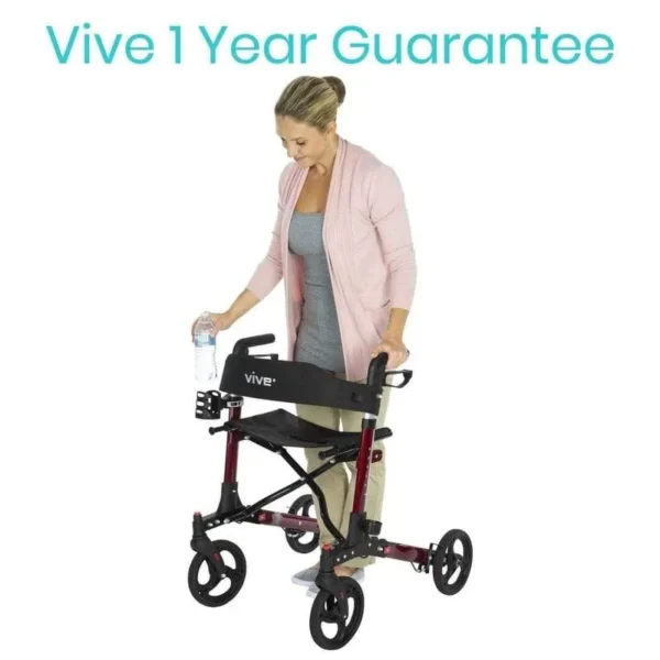 A woman is pushing her walker with the text " vive 1 year guarantee ".