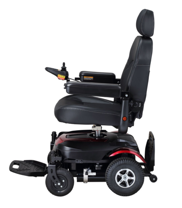 A red and black motorized wheelchair with the seat up.