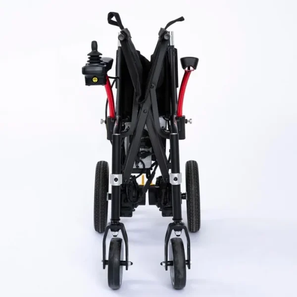 A rear view of the back wheel of an electric wheelchair.