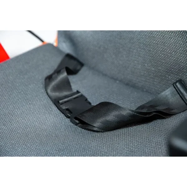 A seat belt is shown on the back of a car.