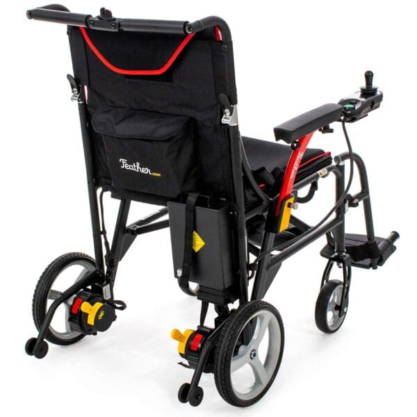 A wheelchair with the back seat folded down.