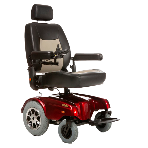 A red motorized wheelchair with the seat up.