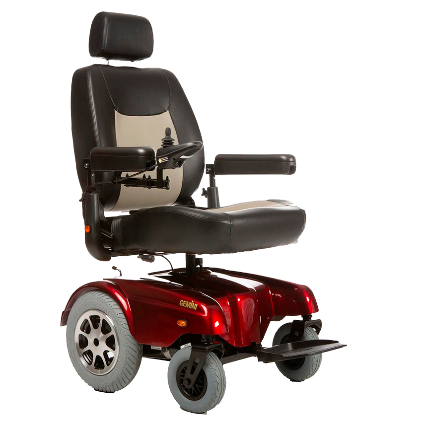 A red motorized wheelchair with the seat up.