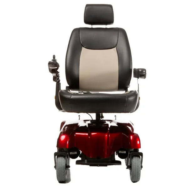 A red and black motorized wheelchair with the seat up.