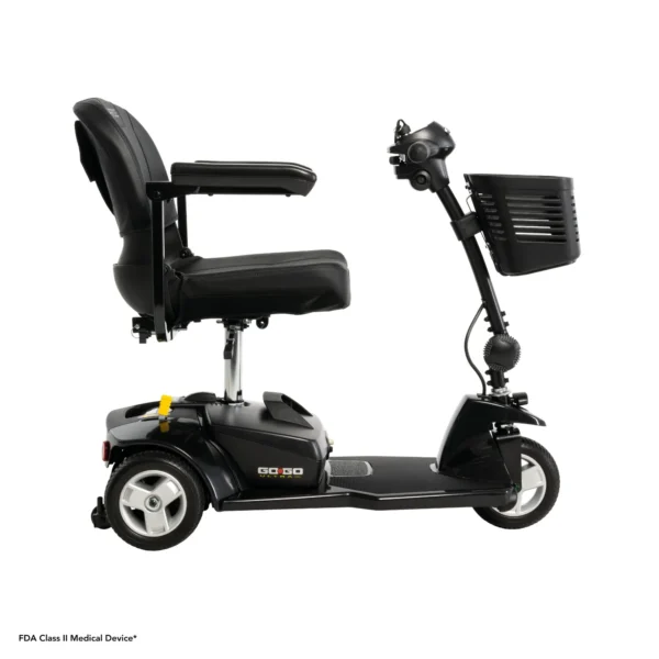 A black scooter with a seat on it.