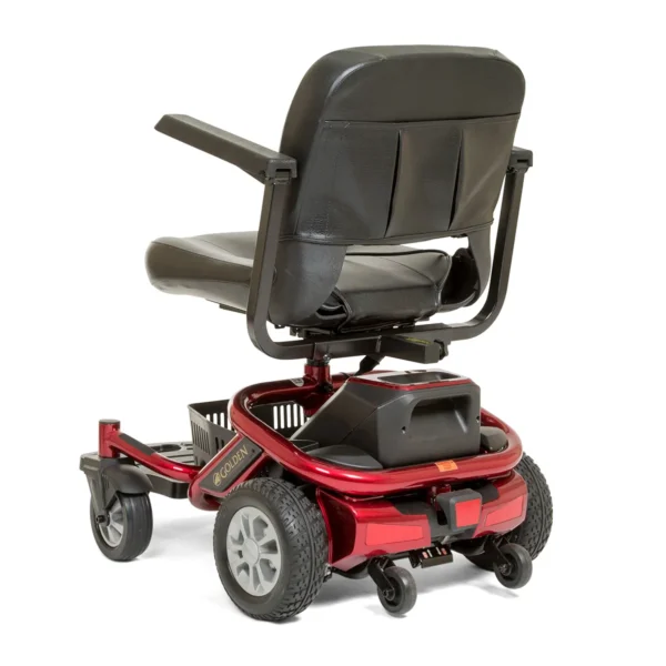 A red motorized wheelchair with black seat and back.