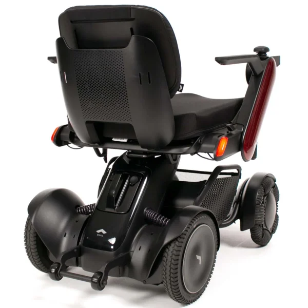 A black scooter with a seat up.