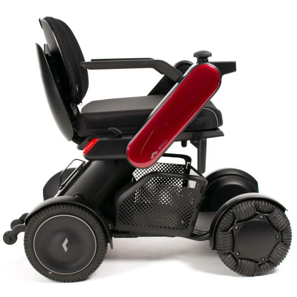 A black scooter with red seat and wheels.