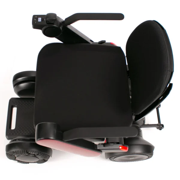 A black scooter with a seat up.