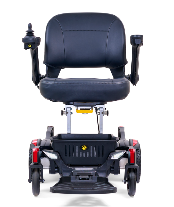 A black motorized wheelchair with the back seat up.