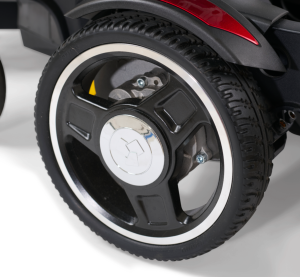 A close up of the wheel on a scooter