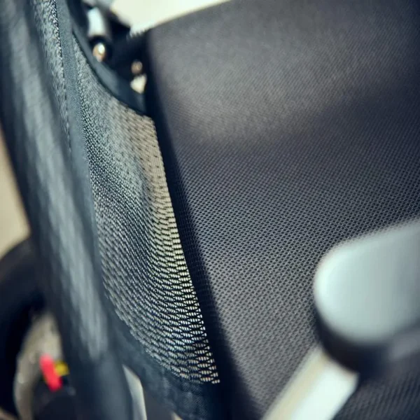 A close up of the seat back on an office chair