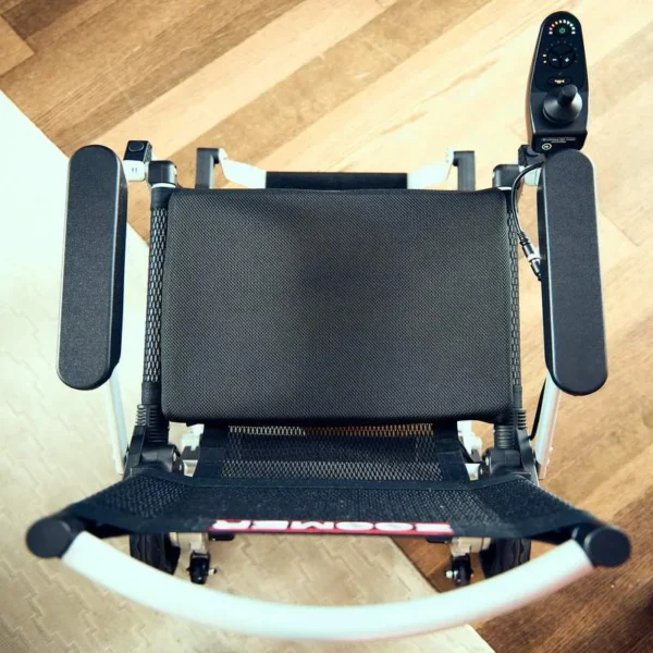 A view of the back of a wheelchair.